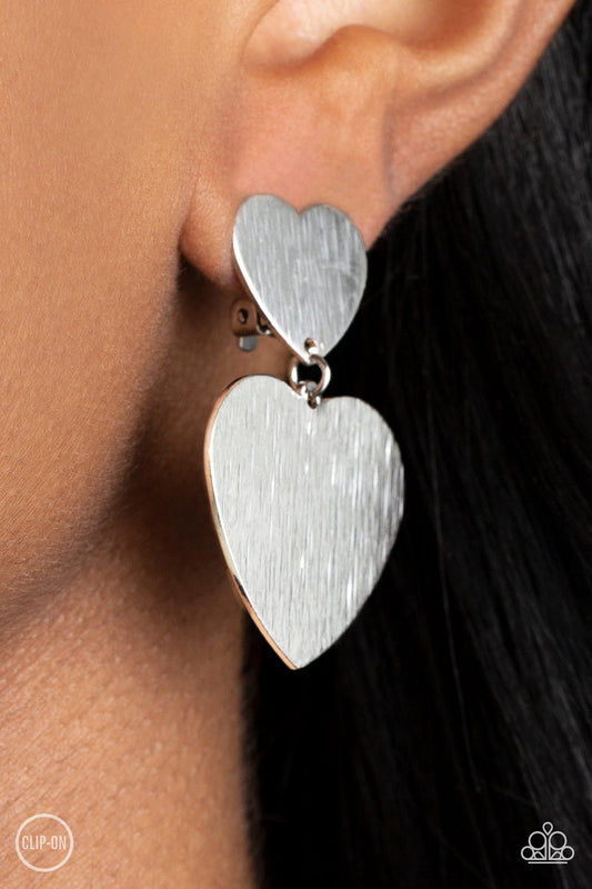Cowgirl Crush (Silver Clip-On Earrings) by Paparazzi Accessories